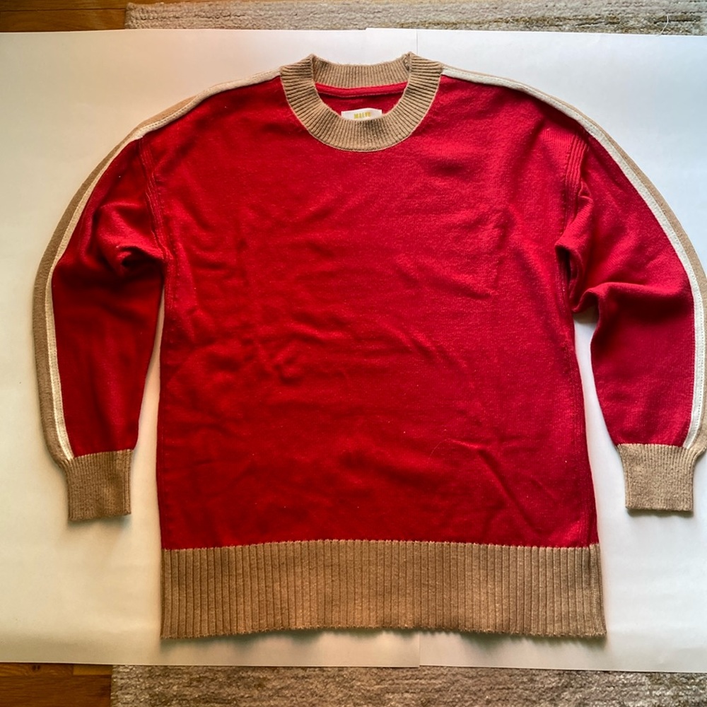 Brand new sweater XS. It fits like SM or MED. Red, tan and cream.